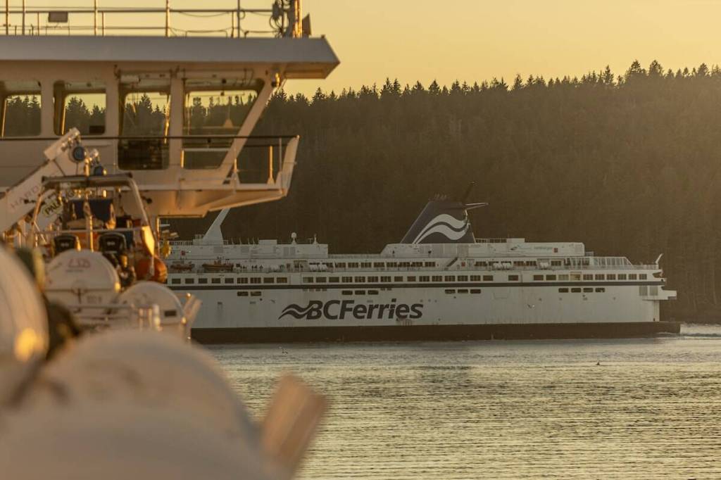 A ferry passes by approximately halfway through a BC Ferries sailing from Tsawwassen to Swartz Bay.